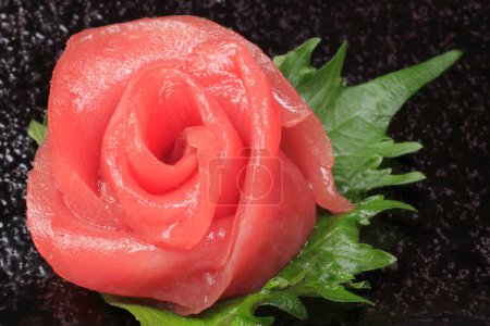 Photo for Tuna sashimi roll rose flower decorated - Royalty Free Image