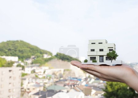 Photo for Close-up view of architect presenting model of house - Royalty Free Image