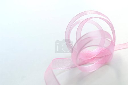 Photo for Pink ribbon curled into a circle - Royalty Free Image