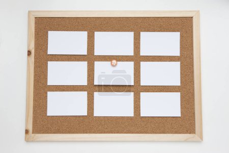Photo for Blank business cards pinned on cork board - Royalty Free Image