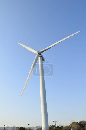 Photo for Windmill for electric power production with blue sky background - Royalty Free Image