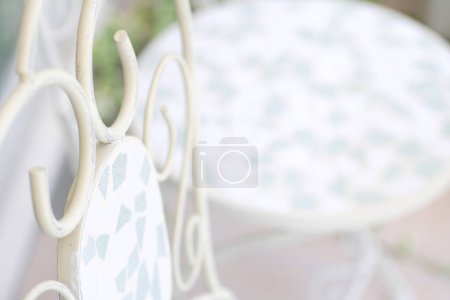 Photo for White chair in the garden on background, close up - Royalty Free Image