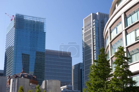 Photo for Bottom view of modern office building in Japanese city - Royalty Free Image