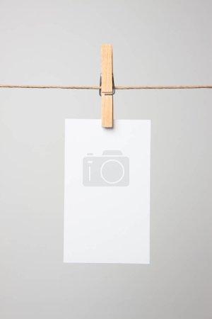 blank card hanging on rope,  copy space 
