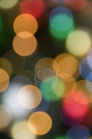 Téléchargez les photos : Fond de Noël flou avec des lumières bokeh - en image libre de droit