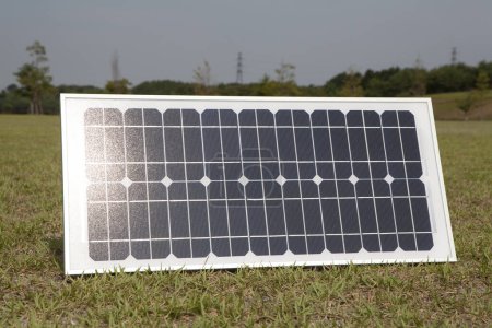 Photo for Solar panel on green grass - Royalty Free Image