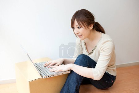 Photo for Woman working on a computer - Royalty Free Image