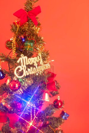 Photo for Christmas tree on pink background. - Royalty Free Image