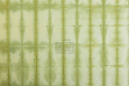 Téléchargez les photos : Un mur vert avec un motif - en image libre de droit