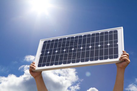 Photo for Hands holding solar panel. concept of solar energy - Royalty Free Image