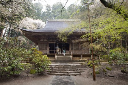 Photo for Scenic shot of visitors at ancient Japanese temple - Royalty Free Image