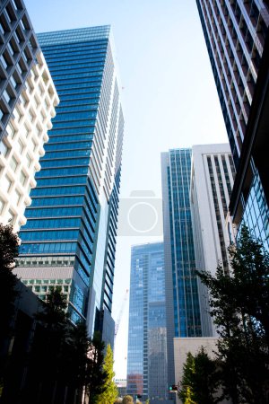 Photo for Bottom view of modern office building in Japanese city - Royalty Free Image
