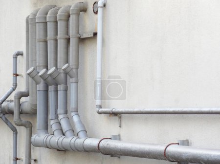 Photo for Pipes in urban building, pipes of an industrial heating system - Royalty Free Image