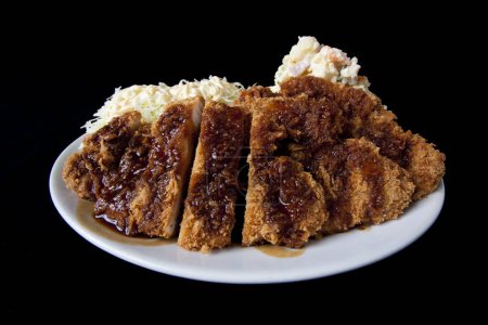 Photo for Japanese traditional cuisine - fried pork with rice on white plate - Royalty Free Image