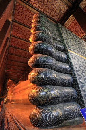 Photo for Budda statue in Wat Phra Kaew in Bangkok, Thailand - is a sacred temple and it's a part of the Thai grand palace, the Temple houses an ancient Emerald Buddha - Royalty Free Image