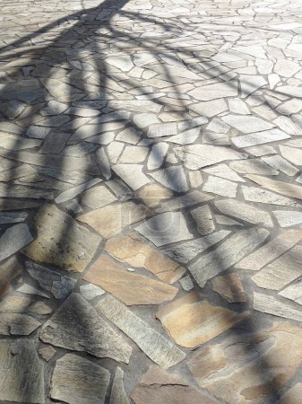 Foto de Pavimento con un montón de piedras. fondo adoquinado - Imagen libre de derechos
