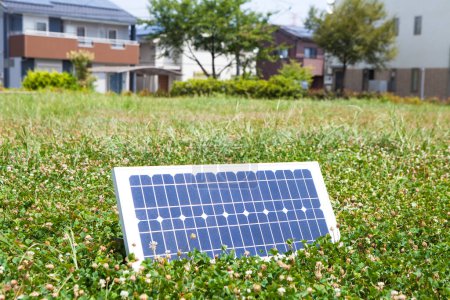 Photo for Solar panel on green grass - Royalty Free Image
