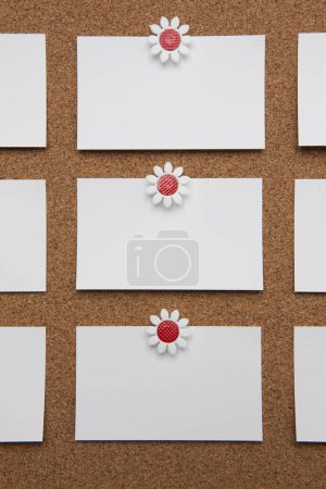 Photo for Blank business cards pinned on cork board, copy space - Royalty Free Image