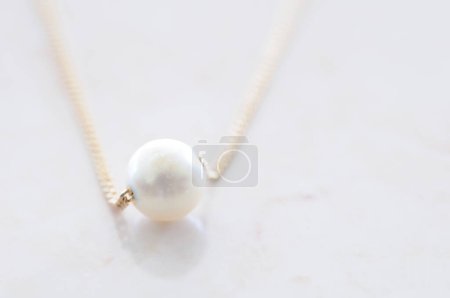 Photo for Pearl necklace on white background - Royalty Free Image