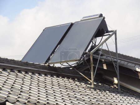 Photo for Roof of a house with solar system - Royalty Free Image