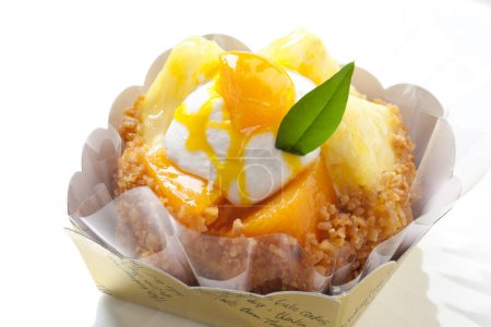 Photo for Vanilla ice cream with mango and pineapple - Royalty Free Image