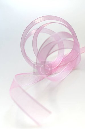 Photo for Pink ribbon curled into a circle - Royalty Free Image