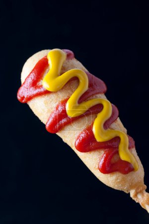 Photo for Close up of hot corn dog with ketchup - Royalty Free Image