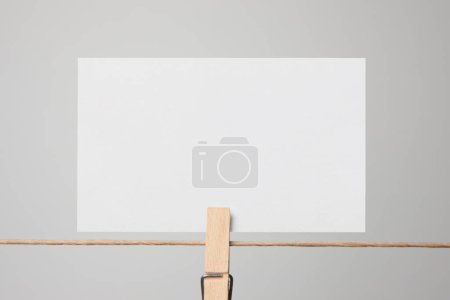 blank card hanging on rope,  copy space 
