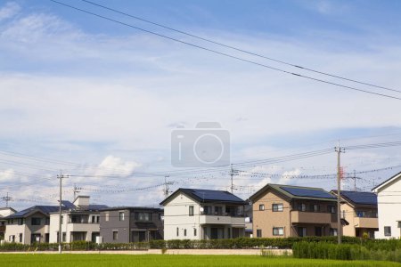 Photo for Solar panels on roofs of buildings, alternative energy - Royalty Free Image