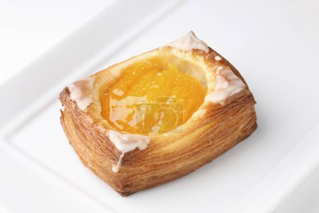 Photo for Sweet croissant with cream on white background - Royalty Free Image