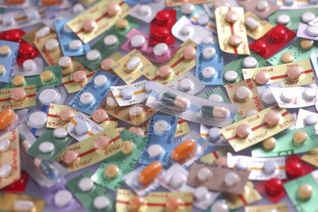 Photo for Many blisters with pills and capsules, pharmaceutical background - Royalty Free Image