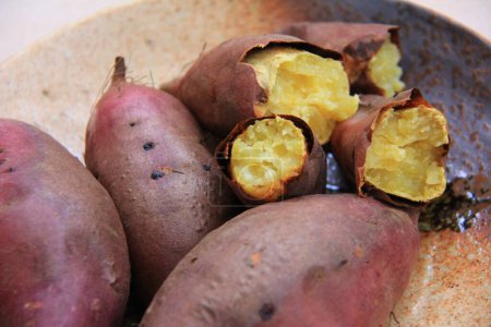 Photo for Close up of delicious baked sweet potatoes - Royalty Free Image