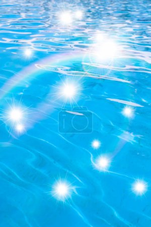 Photo for Beautiful rainbow and blue water in swimming pool - Royalty Free Image