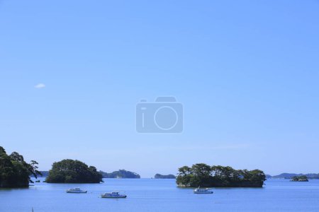 Photo for Beautiful scenery of sea and rocky islands with lush green vegetation. Matsushima islands in Miyagi Prefecture, Japan - Royalty Free Image