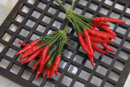 Téléchargez les photos : Vue rapprochée des piments rouges chauds dans la cuisine - en image libre de droit