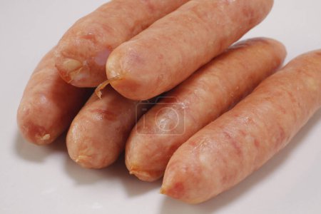 Photo for A group of tasty sausages on background, close up - Royalty Free Image