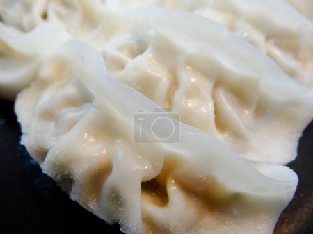 Photo for Boiled gyoza dumplings, chinese food - Royalty Free Image