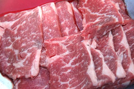 Photo for Fresh raw beef on background, close up - Royalty Free Image