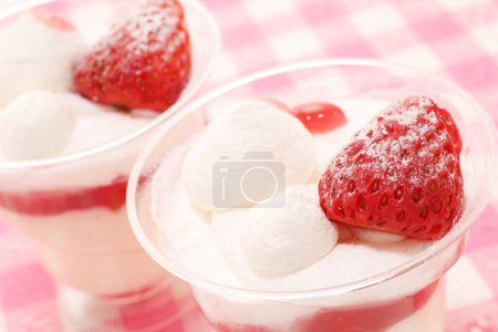 Photo for Desserts with fresh strawberries with ice cream in the glasses on background, close up - Royalty Free Image