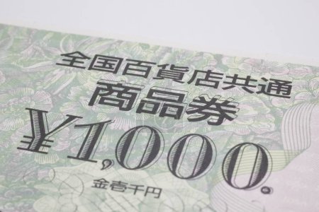 Téléchargez les photos : Carte cadeau avec japonais 1000 yen sur fond, gros plan - en image libre de droit