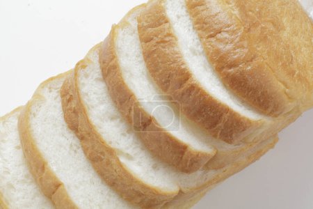 Photo for Sliced bread on white background, close up - Royalty Free Image