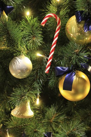 Photo for Christmas tree with festive decorations, close up view - Royalty Free Image