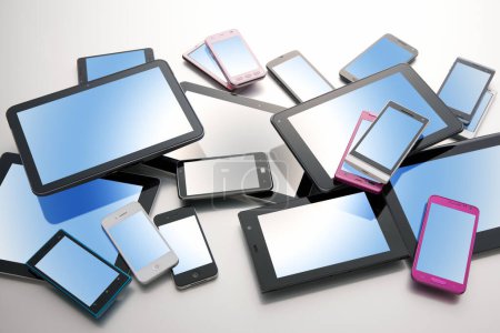 Photo for Close-up view of modern digital devices on grey background - Royalty Free Image
