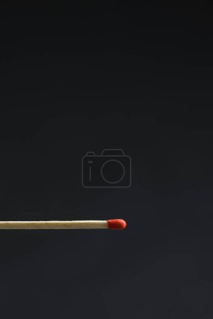 Photo for Wooden match on a black background - Royalty Free Image