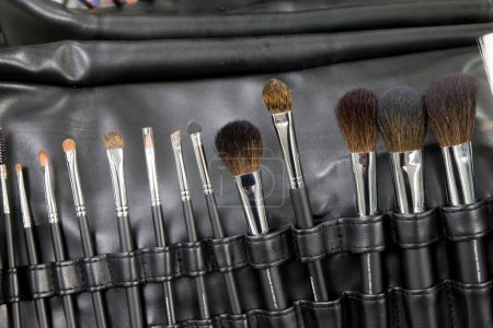 Photo for Set of professional makeup brushes on background, close up - Royalty Free Image