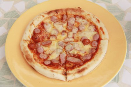 Photo for Delicious pizza with sausages and cheese - Royalty Free Image
