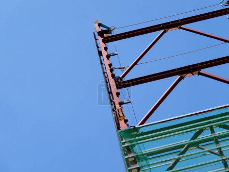 Photo for Construction of a crane on the roof of the building and sky - Royalty Free Image