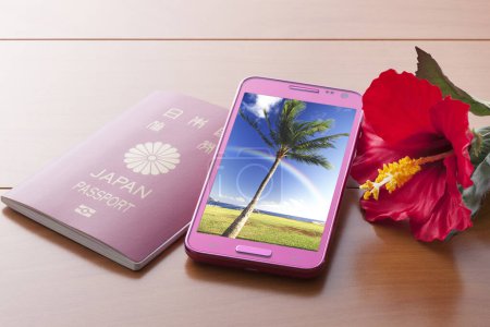 Foto de Japón pasaporte, teléfono inteligente y flor de hibisco rojo. Concepto de viaje - Imagen libre de derechos
