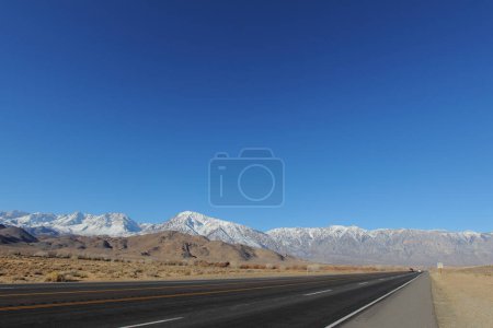 Photo for Beautiful landscape with snow-covered mountains and blue sky - Royalty Free Image