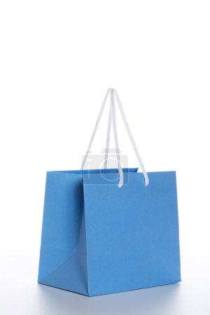 Photo for Close-up view of blue shopping bag on white background - Royalty Free Image